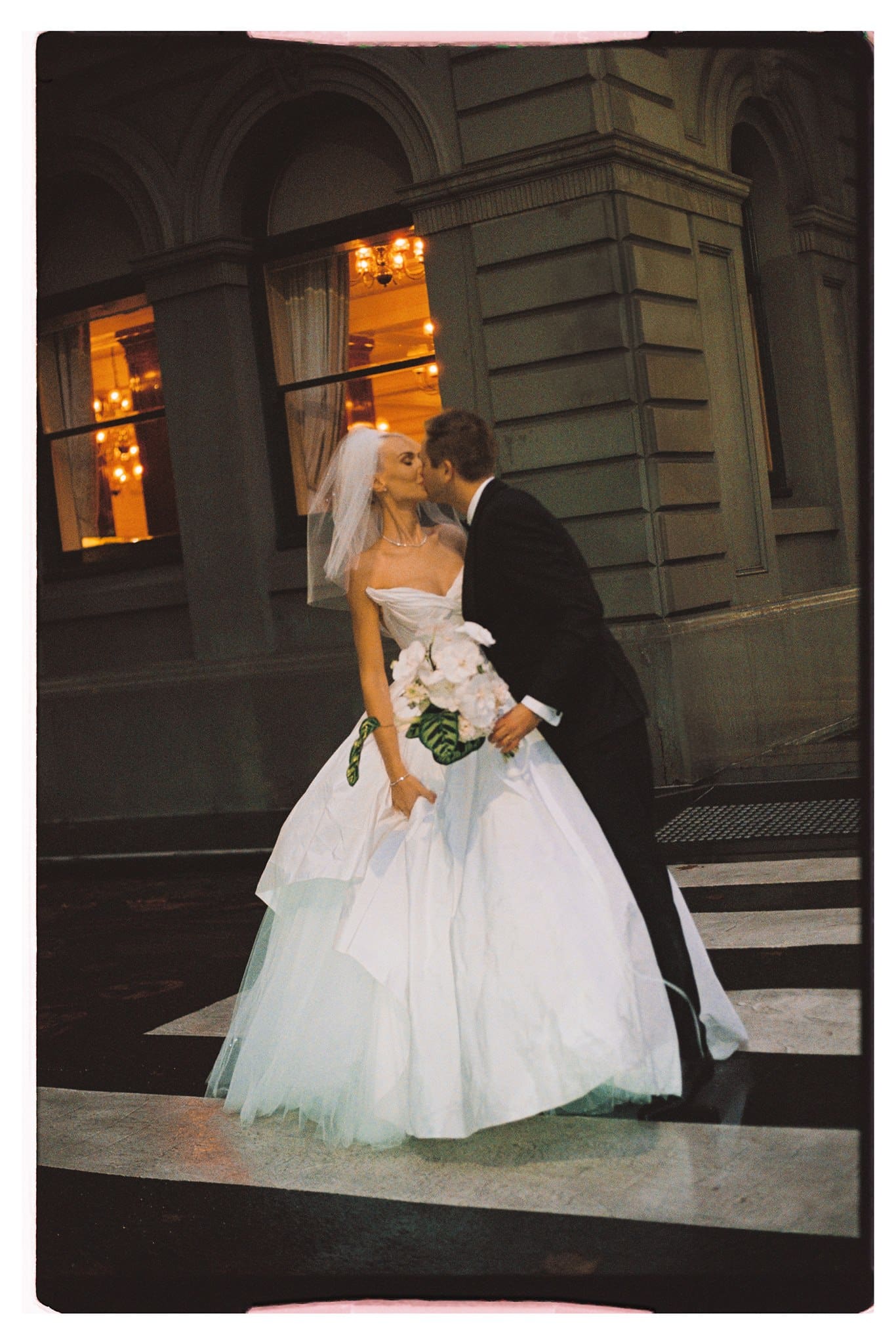 Bianca and Tyson on Film Bride and Groom walking through the streets of Melbourne captured in 35mm film