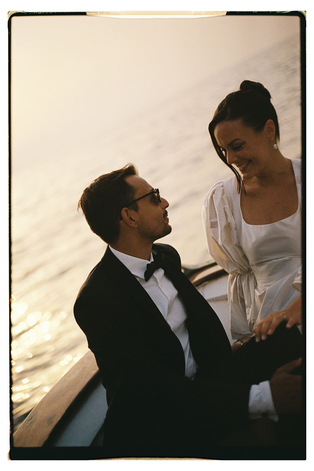 Liv and Dave Bridal portraits on a yacht around the cliffs of Capri, Italy